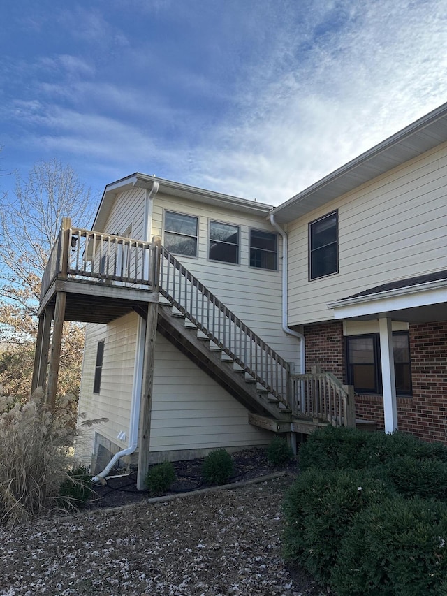 view of side of property with central AC