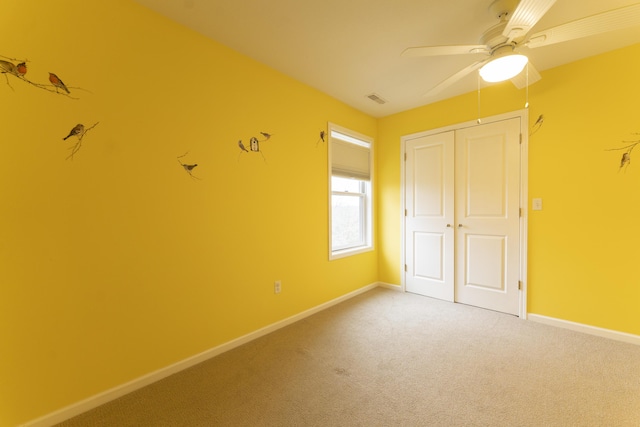12500 W Rocheport Gravel Rd, Rocheport, MO 65279 - unfurnished bedroom with a closet, carpet flooring, baseboards, and visible vents