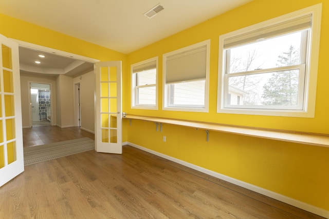 12500 W Rocheport Gravel Rd, Rocheport, MO 65279 - empty room with visible vents, french doors, baseboards, and a healthy amount of sunlight