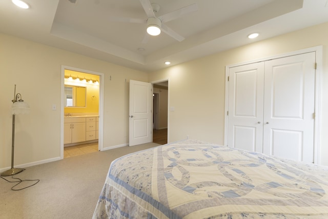 12500 W Rocheport Gravel Rd, Rocheport, MO 65279 - bedroom with light carpet, a raised ceiling, recessed lighting, a closet, and baseboards