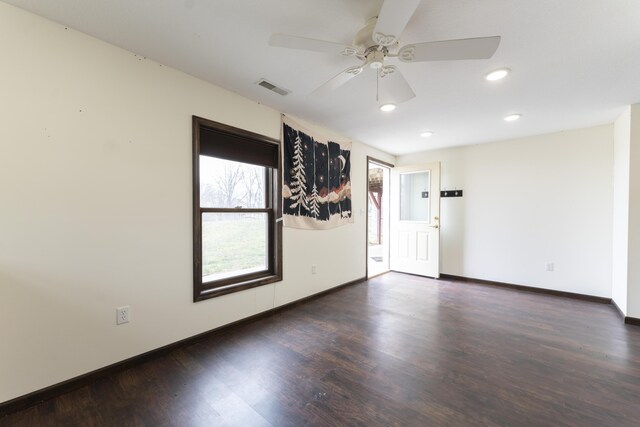 12500 W Rocheport Gravel Rd, Rocheport, MO 65279 - spare room with visible vents, a ceiling fan, baseboards, and wood finished floors