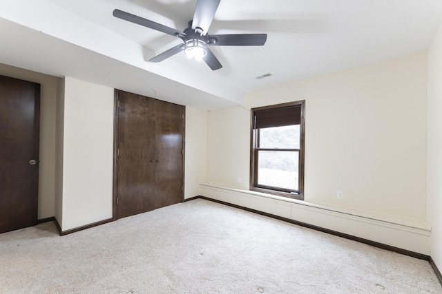 12500 W Rocheport Gravel Rd, Rocheport, MO 65279 - unfurnished bedroom with baseboards, visible vents, and light carpet