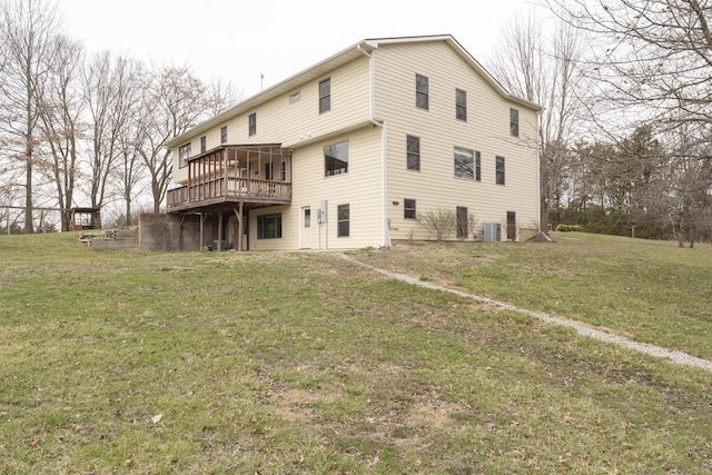 12500 W Rocheport Gravel Rd, Rocheport, MO 65279 - rear view of property featuring a yard, central AC, and a deck