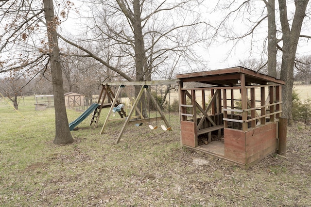 12500 W Rocheport Gravel Rd, Rocheport, MO 65279 - view of yard with a storage unit, an outdoor structure, and a playground