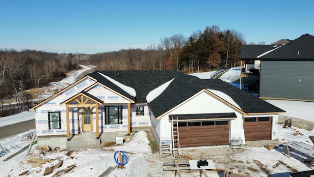 view of front of property with a garage