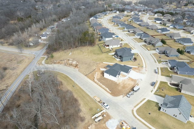 birds eye view of property with a residential view