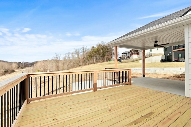 wooden deck with a patio area