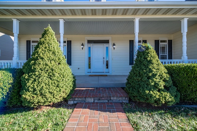 doorway to property featuring a porch