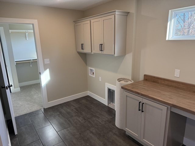 laundry room featuring cabinets and hookup for a washing machine