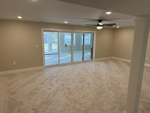 unfurnished room featuring carpet flooring and ceiling fan