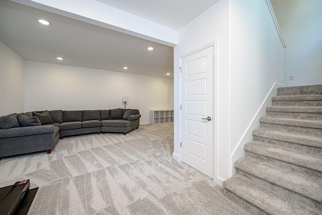 living room featuring light carpet