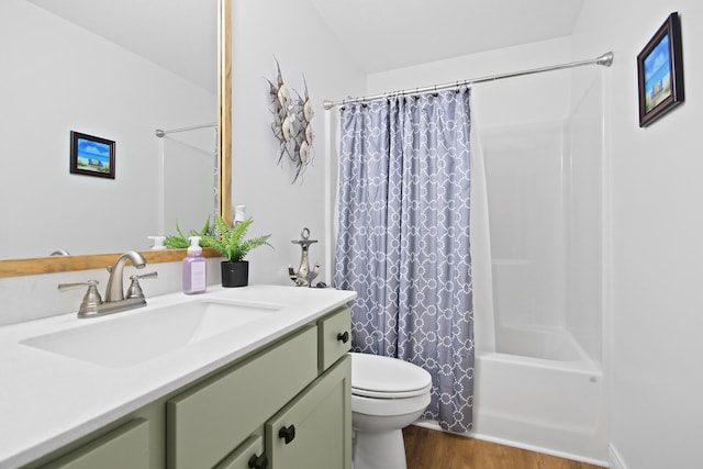 full bathroom with wood-type flooring, vanity, toilet, and shower / bath combo