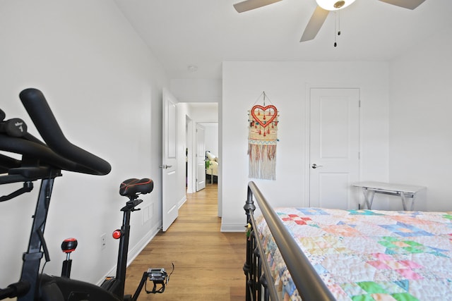 bedroom featuring ceiling fan and light hardwood / wood-style flooring