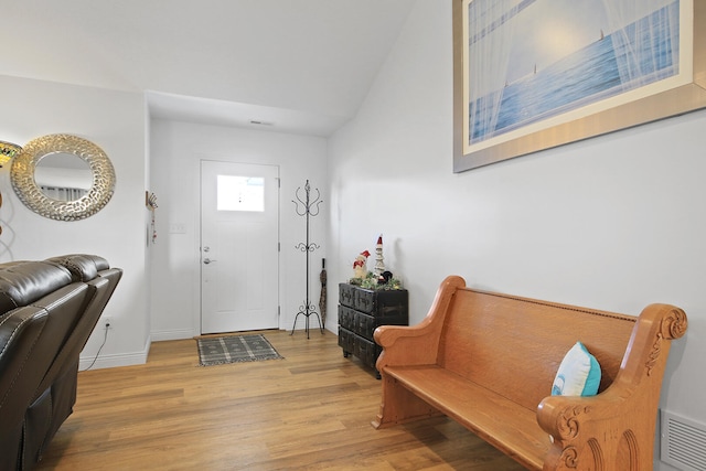 entrance foyer featuring light hardwood / wood-style floors