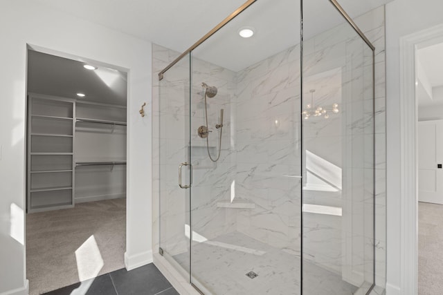 bathroom featuring tile patterned floors and walk in shower