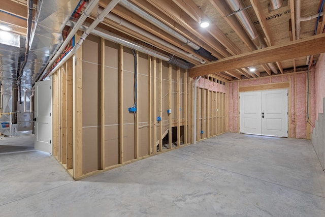 basement featuring heating unit