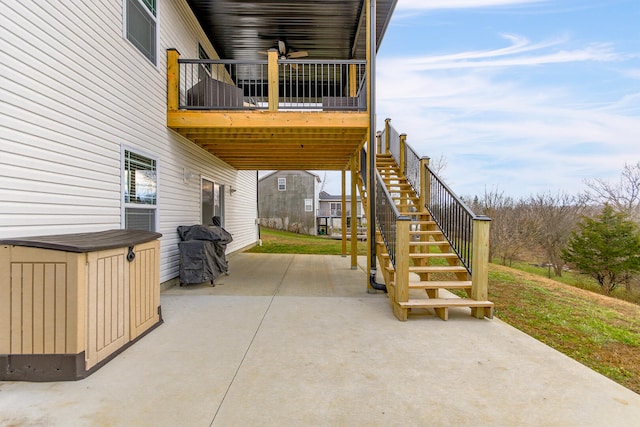 view of patio / terrace with ceiling fan and grilling area