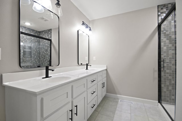 bathroom featuring vanity and walk in shower