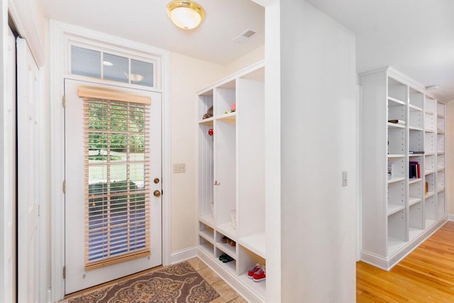 mudroom with hardwood / wood-style floors