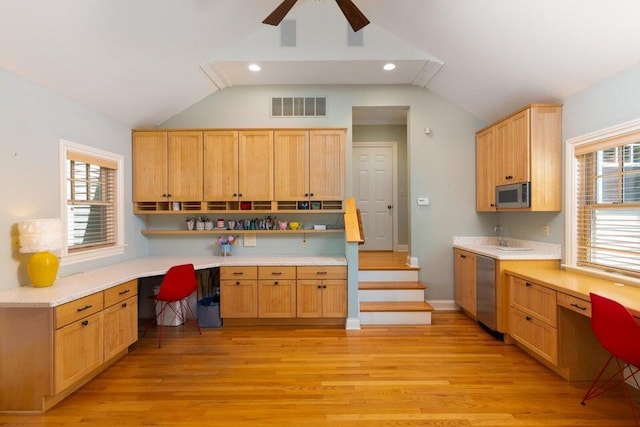 513 Rockhill Rd, Columbia, MO 65201 - kitchen featuring built in study area, appliances with stainless steel finishes, lofted ceiling, ceiling fan, and light wood-style floors