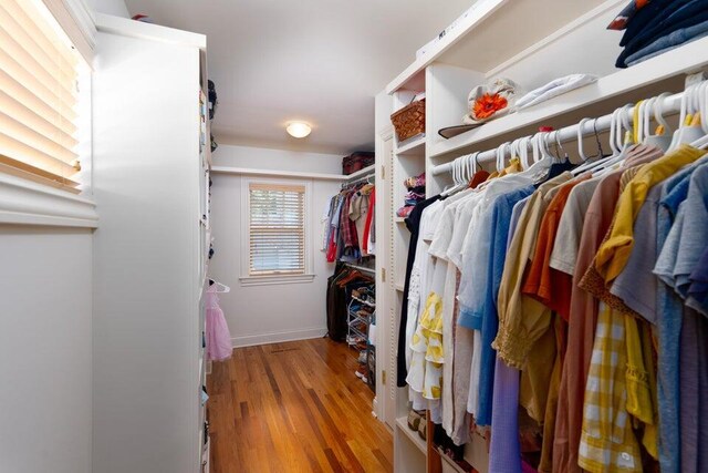 513 Rockhill Rd, Columbia, MO 65201 - walk in closet featuring wood finished floors