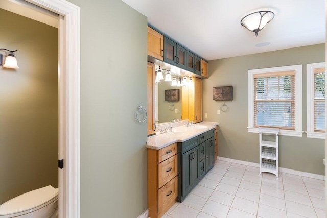 513 Rockhill Rd, Columbia, MO 65201 - bathroom with double vanity and tile patterned floors
