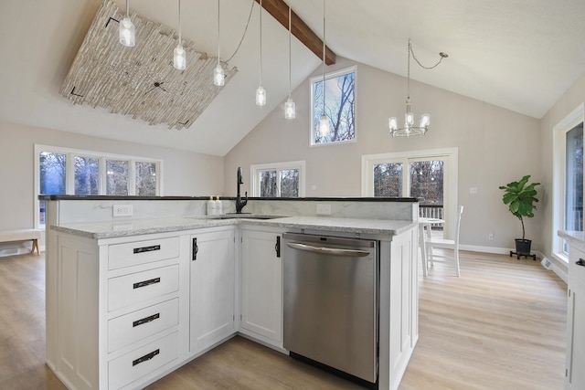 kitchen featuring white cabinetry, dishwasher, light stone counters, and sink