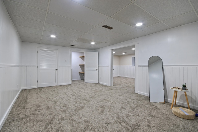 basement with light carpet