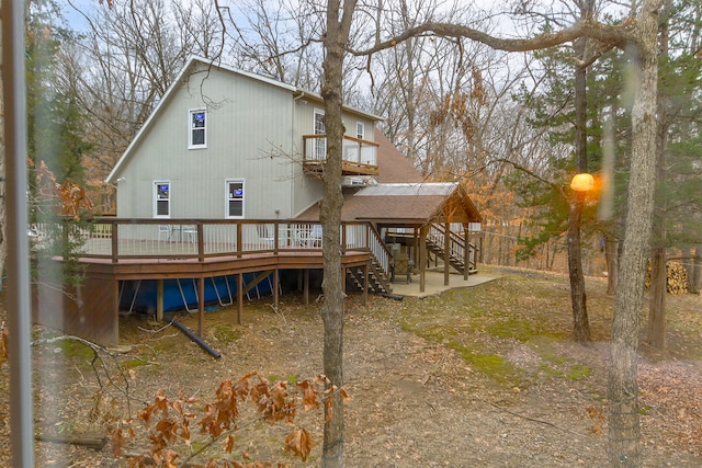 rear view of property with a deck