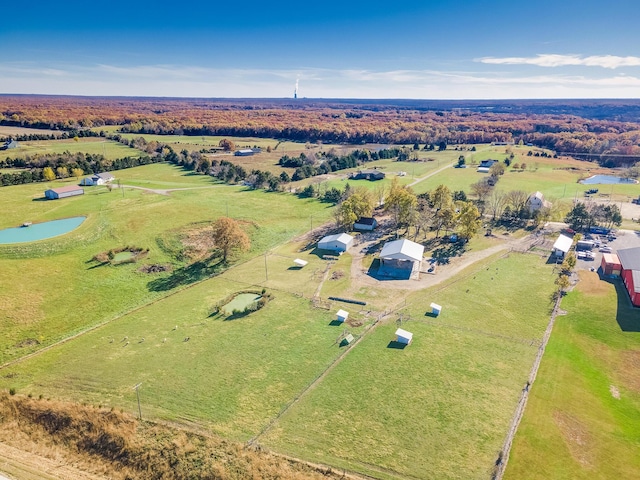 birds eye view of property featuring a rural view