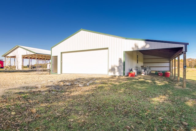 garage with a yard