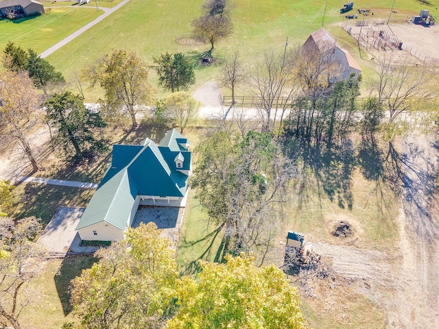 birds eye view of property with a rural view