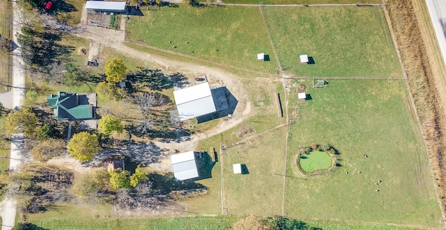 birds eye view of property featuring a rural view