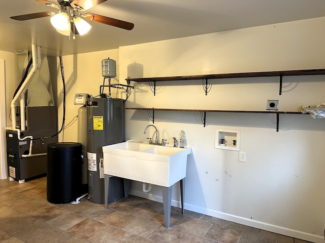 washroom featuring washer hookup, ceiling fan, electric dryer hookup, and water heater