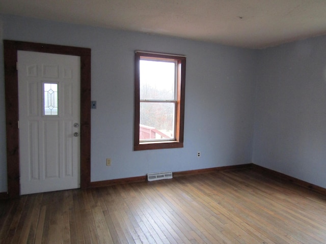 entrance foyer featuring hardwood / wood-style flooring