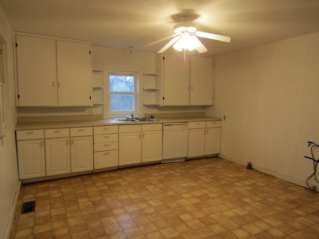 kitchen featuring white dishwasher, ceiling fan, white cabinetry, and sink