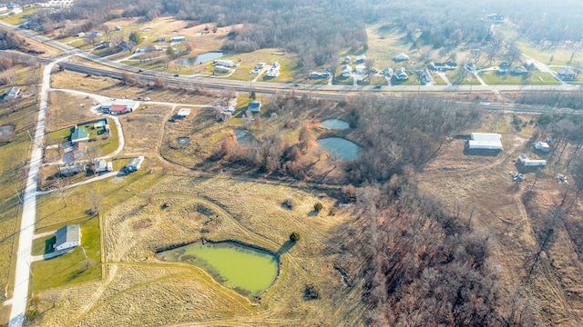 bird's eye view with a rural view and a water view