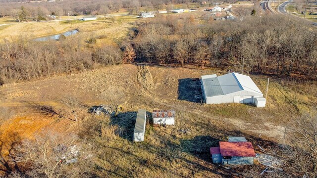 bird's eye view featuring a rural view and a water view