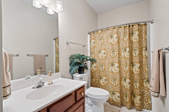 full bath with vanity, a shower with shower curtain, tile patterned flooring, and toilet