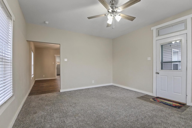 carpeted empty room with ceiling fan