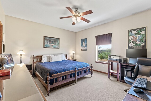 bedroom with ceiling fan and carpet floors