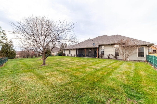 view of yard featuring a sunroom