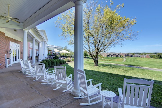 view of patio featuring french doors and a ceiling fan