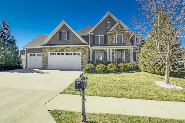 view of front facade with an attached garage, stone siding, concrete driveway, and a front yard