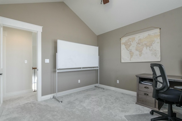 office space featuring carpet floors, lofted ceiling, and baseboards