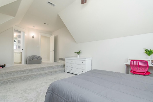 bedroom with carpet, visible vents, lofted ceiling, and baseboards