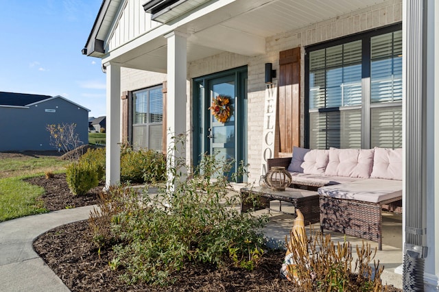 property entrance with covered porch