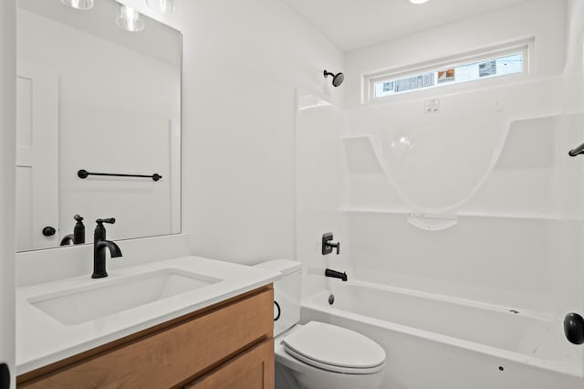 full bathroom with vanity, bathtub / shower combination, and toilet