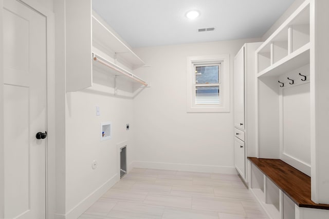 laundry area featuring gas dryer hookup, electric dryer hookup, and washer hookup