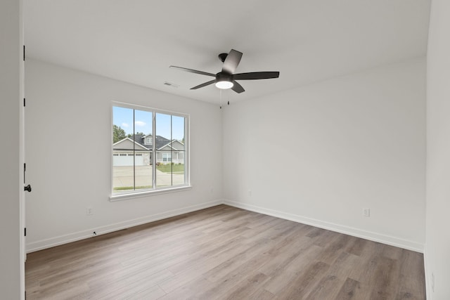 unfurnished room with ceiling fan and light hardwood / wood-style floors